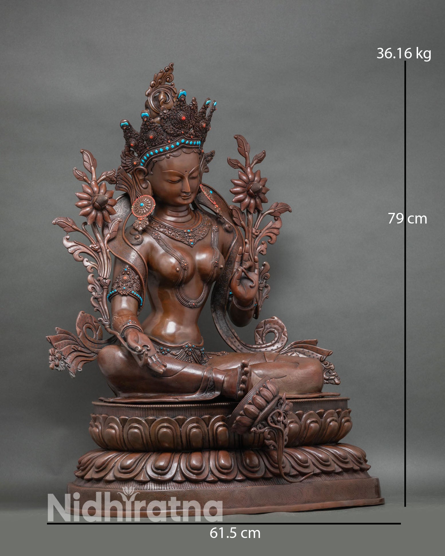 Right profile of Green Tara statue, oxidized copper, meditation and protection posture