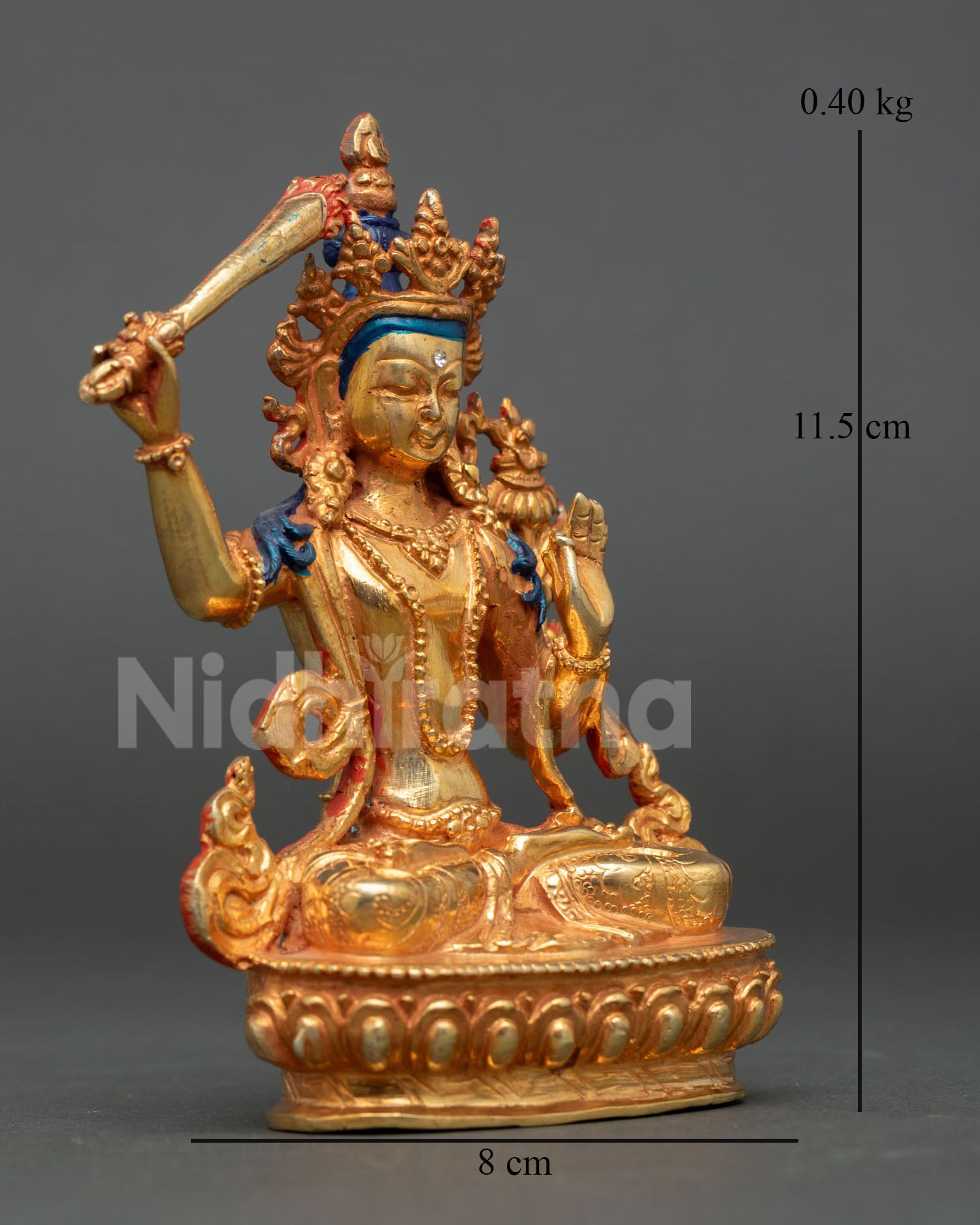 right profile of 24k gold fire gilded manjushri statue from nepal