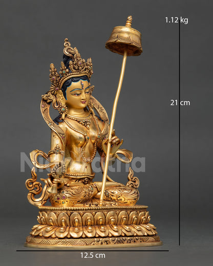 Right profile of Dukkar White Umbrella Goddess statue, gold-gilded copper Buddhist sculpture