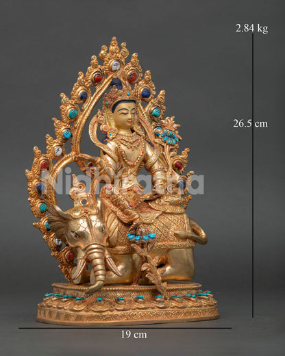 Right profile of Samantabhadra statue seated on six-tusked white elephant sculpture