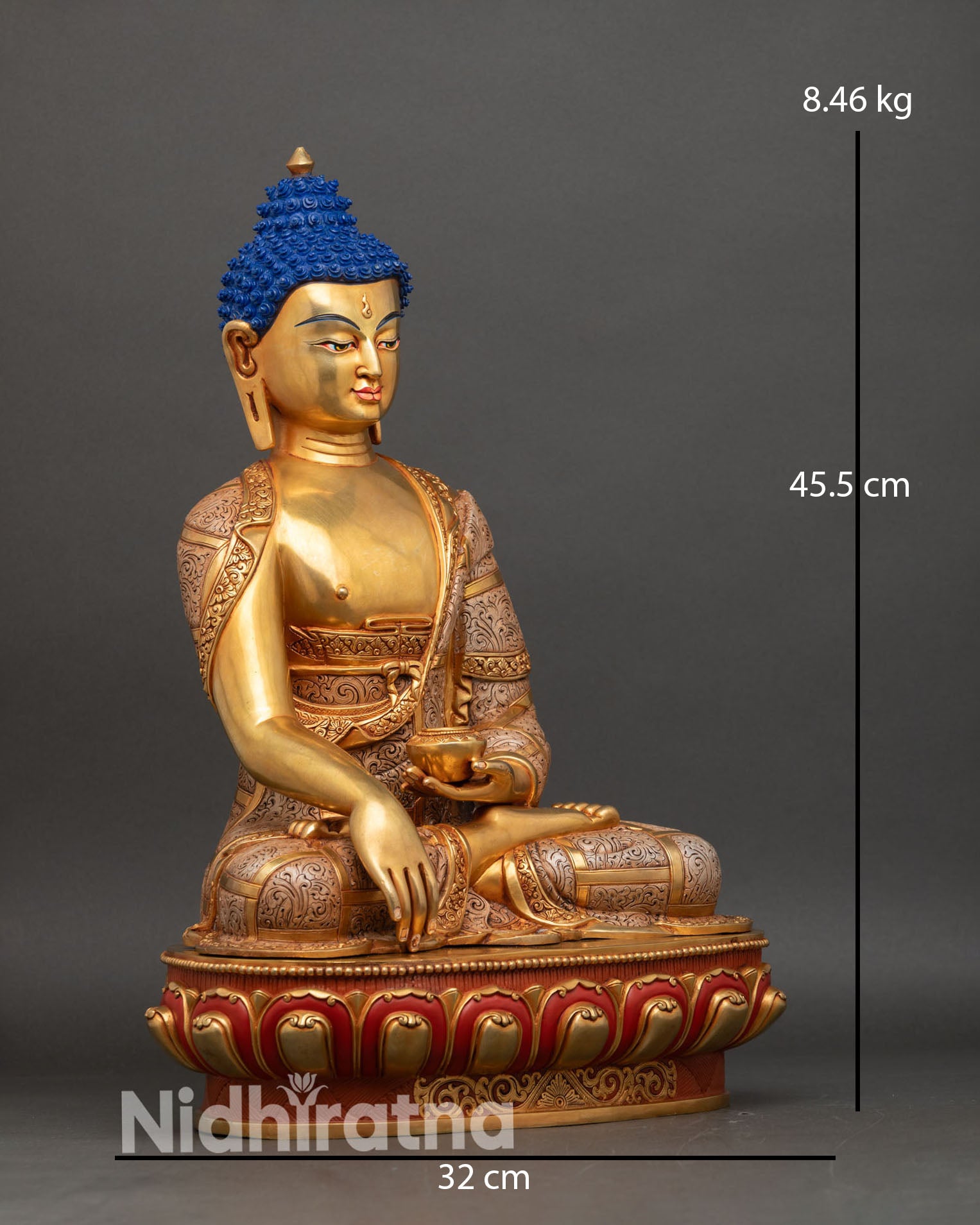 right profile of shakya buddha statue, lotus pedestal, copper and gold detailing