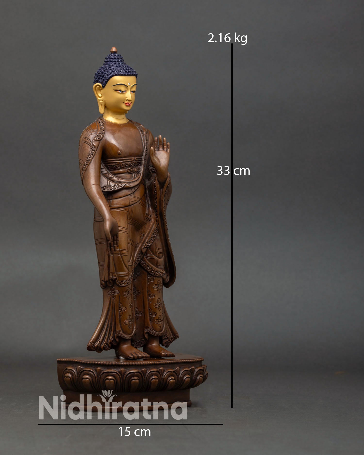 right profile of standing dipankara buddha copper statue with intricate lotus pedestal