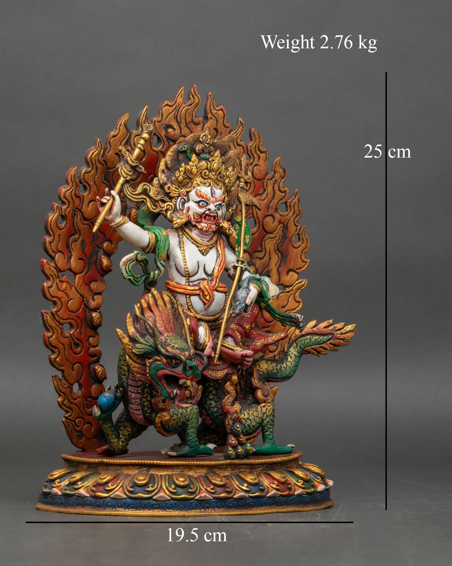 Right profile of White Dzambhala statue on lotus pedestal with dragon mount