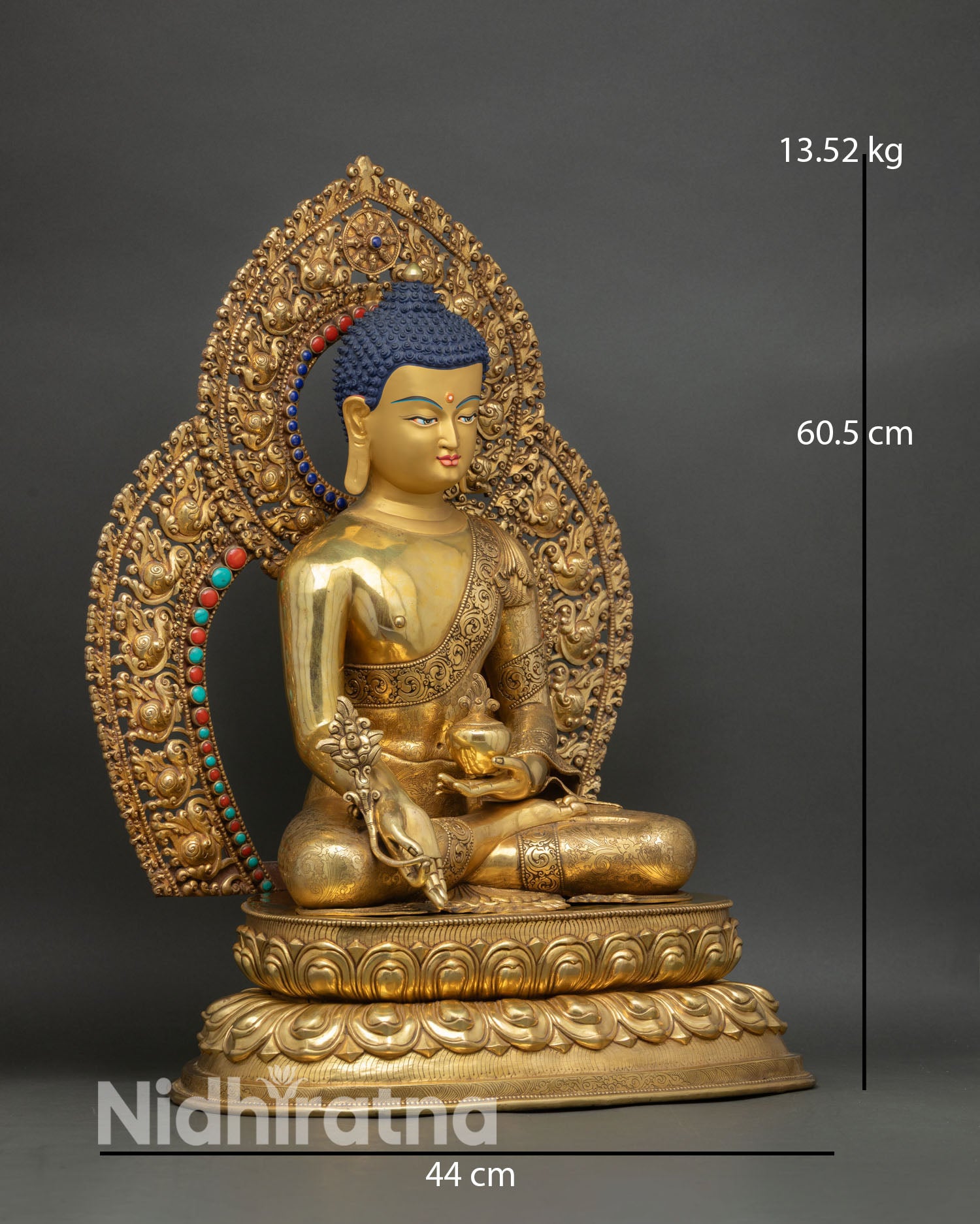 Right side Medicine Buddha statue holding healing bowl myrobalan copper gold Nepal art