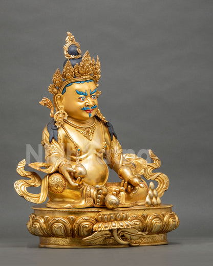 Right side profile view of lost-wax casted copper Yellow Dzambhala wealth deity sculpture.