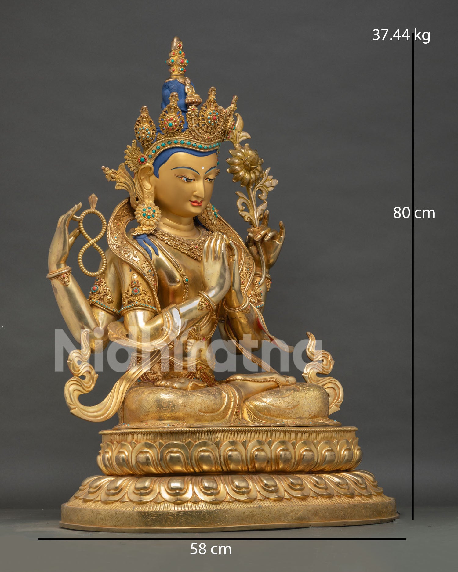 right side view chenrezig statue copper sculpture gold gilded buddhist deity artwork nepal