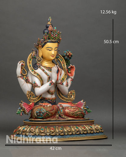 Right side view of Chenrezig statue holding mala and lotus, detailed Himalayan craftsmanship