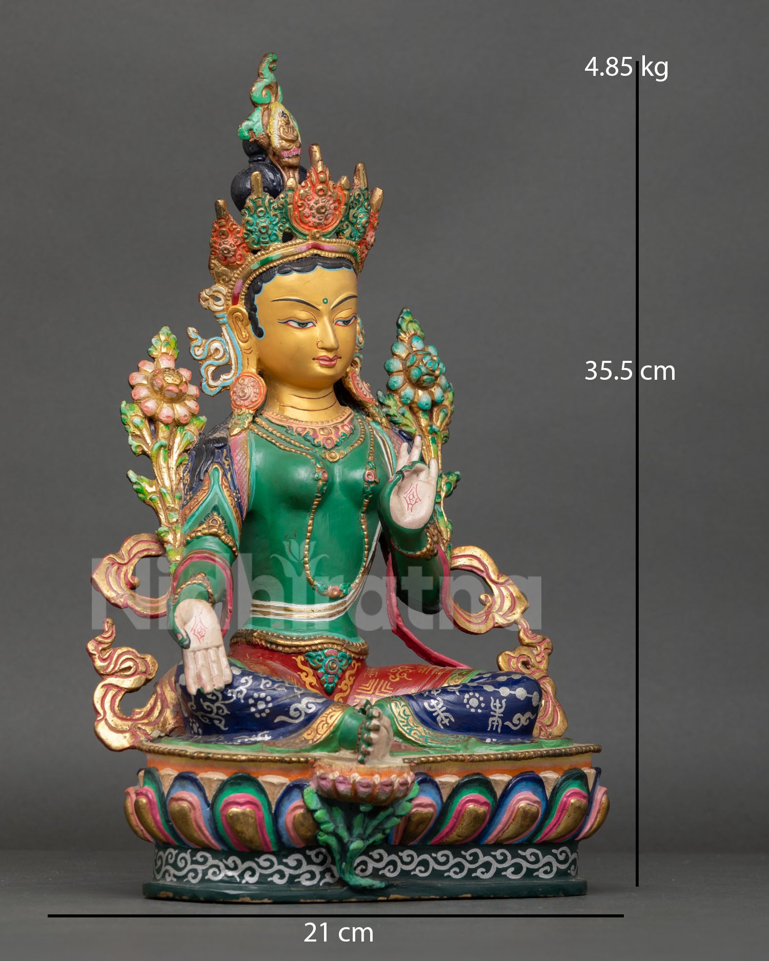 Right side view Green Tara Buddhist statue showing flowing form lotus base and ritual detailing