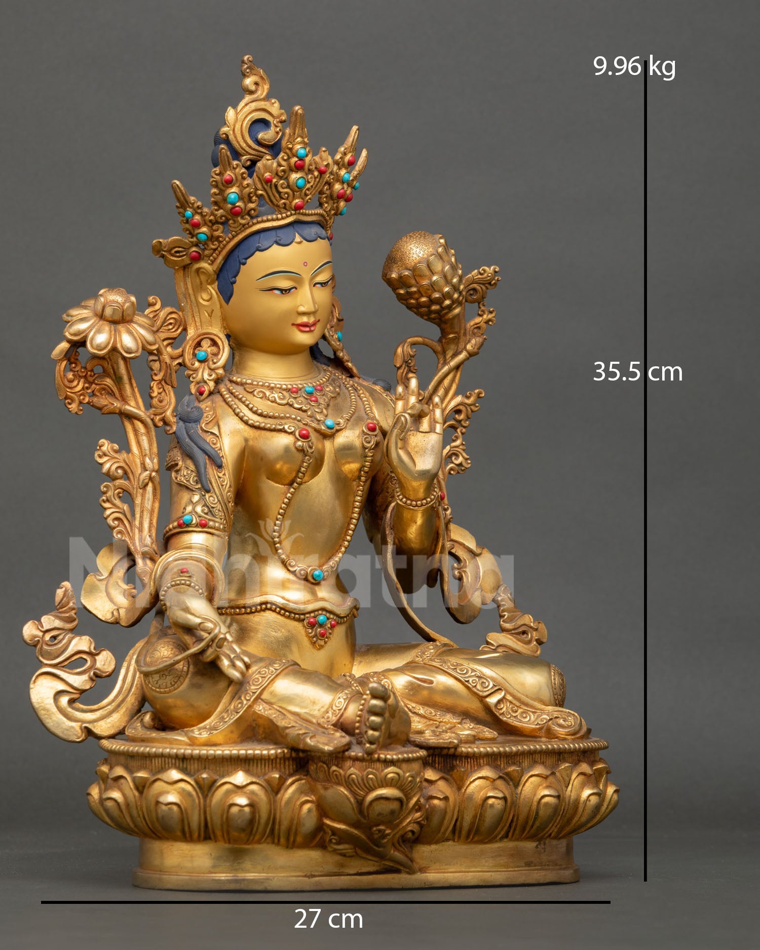right side view green tara statue showing lotus base ornaments and copper craftsmanship