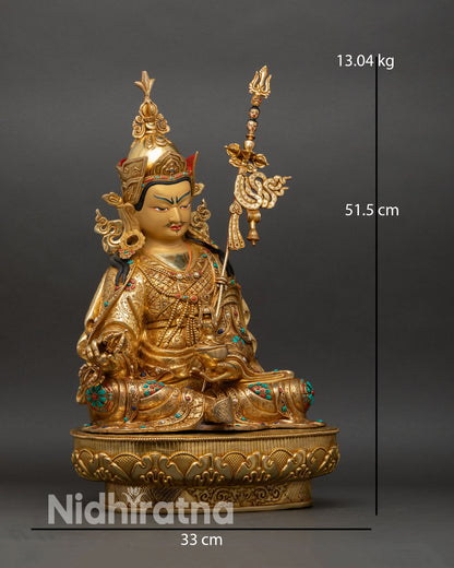 right side view guru rinpoche statue khatvanga staff copper gold gilded