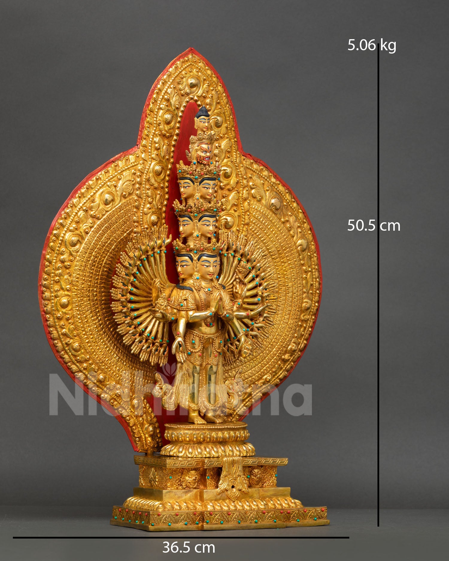 Right-side view of 1000 Armed Chenrezig statue with thousand arms and jeweled adornments