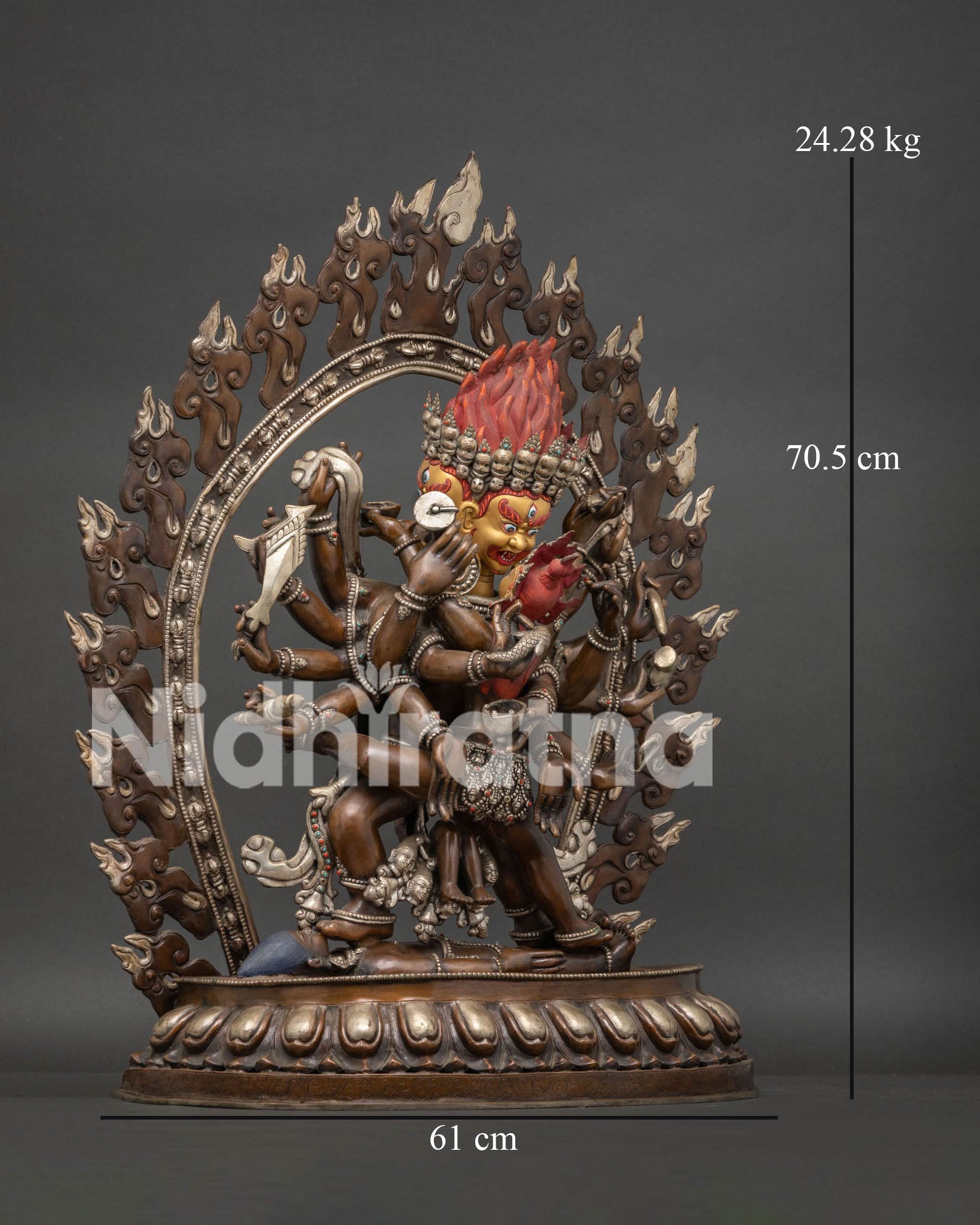 Right side view of 14-Armed Mahakala Yab-Yum copper statue on lotus throne with flaming wisdom halo
