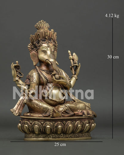Right side view of 30cm copper Ganesh statue in relaxed royal seating posture.