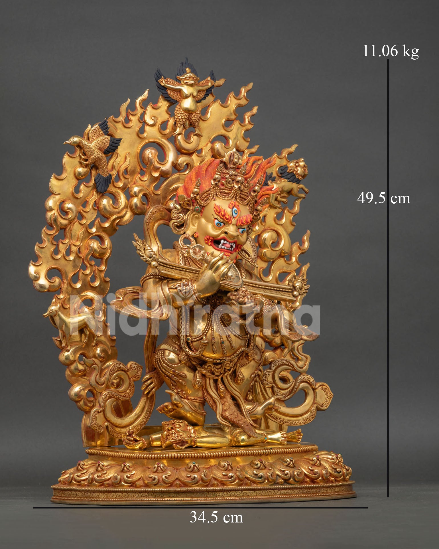 Right side view of Shakya Mahakala statue with tiger skin, kapala, and kartika details