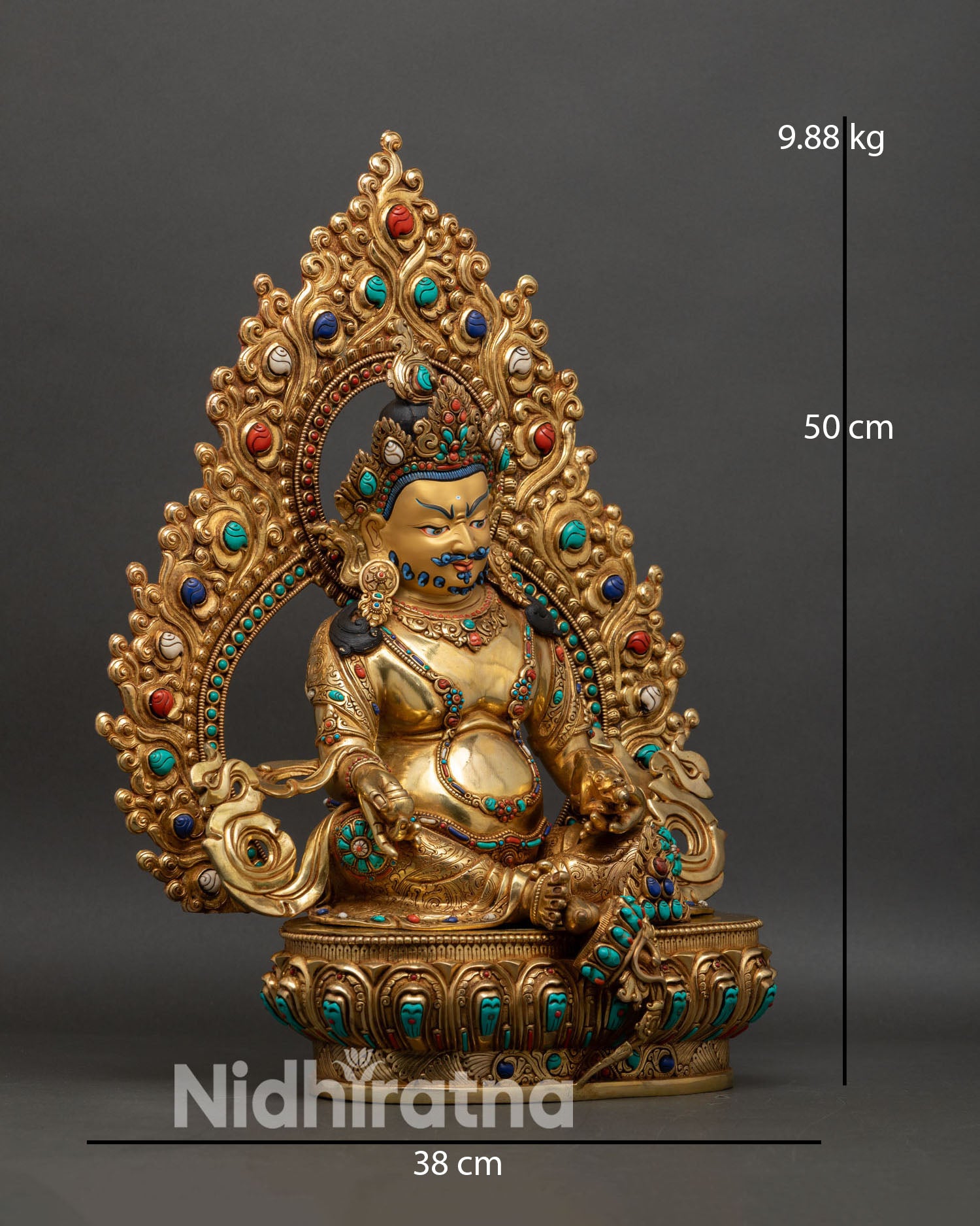 right side view of dzambhala statue holding mongoose and citron, nepal art