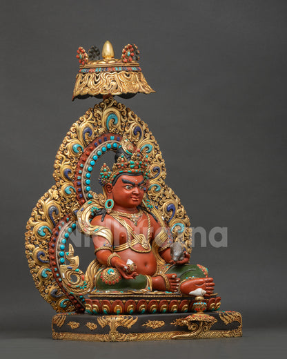 Right side view of Dzambhala Statue holding wish-fulfilling jewel and jeweled mongoose