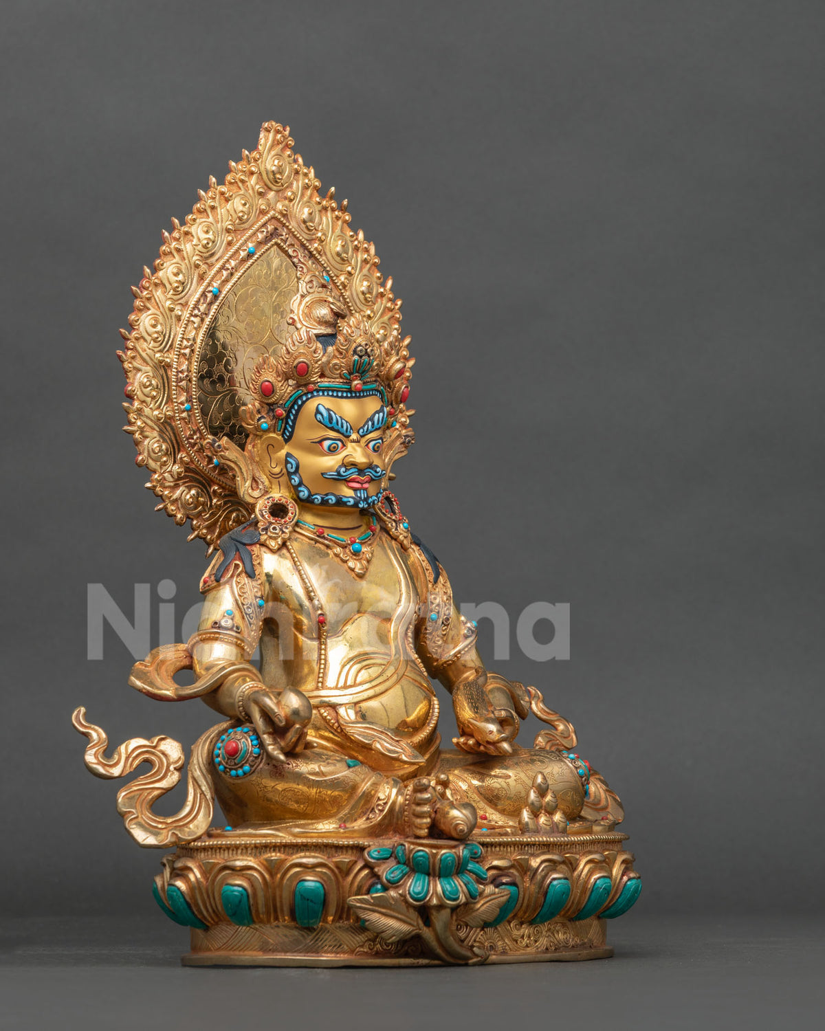 Right side view of Dzambhala statue seated on a lotus pedestal, lost wax cast in Nepal
