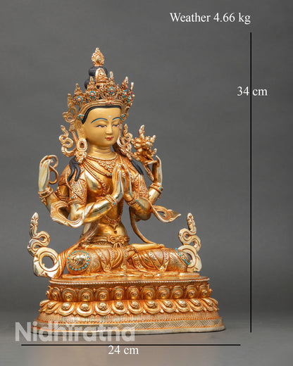 Right side view of four-armed Avalokiteshvara statue with lotus, mala, and jeweled ornaments