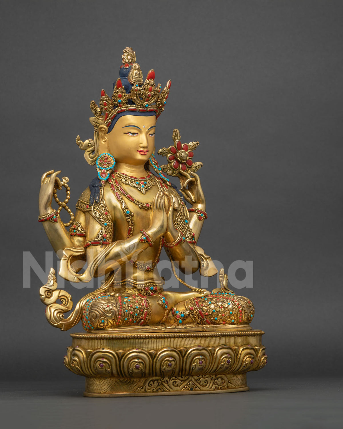 Right side view of four-armed Chenrezig copper statue, gold fire-gilded Avalokiteshvara sculpture