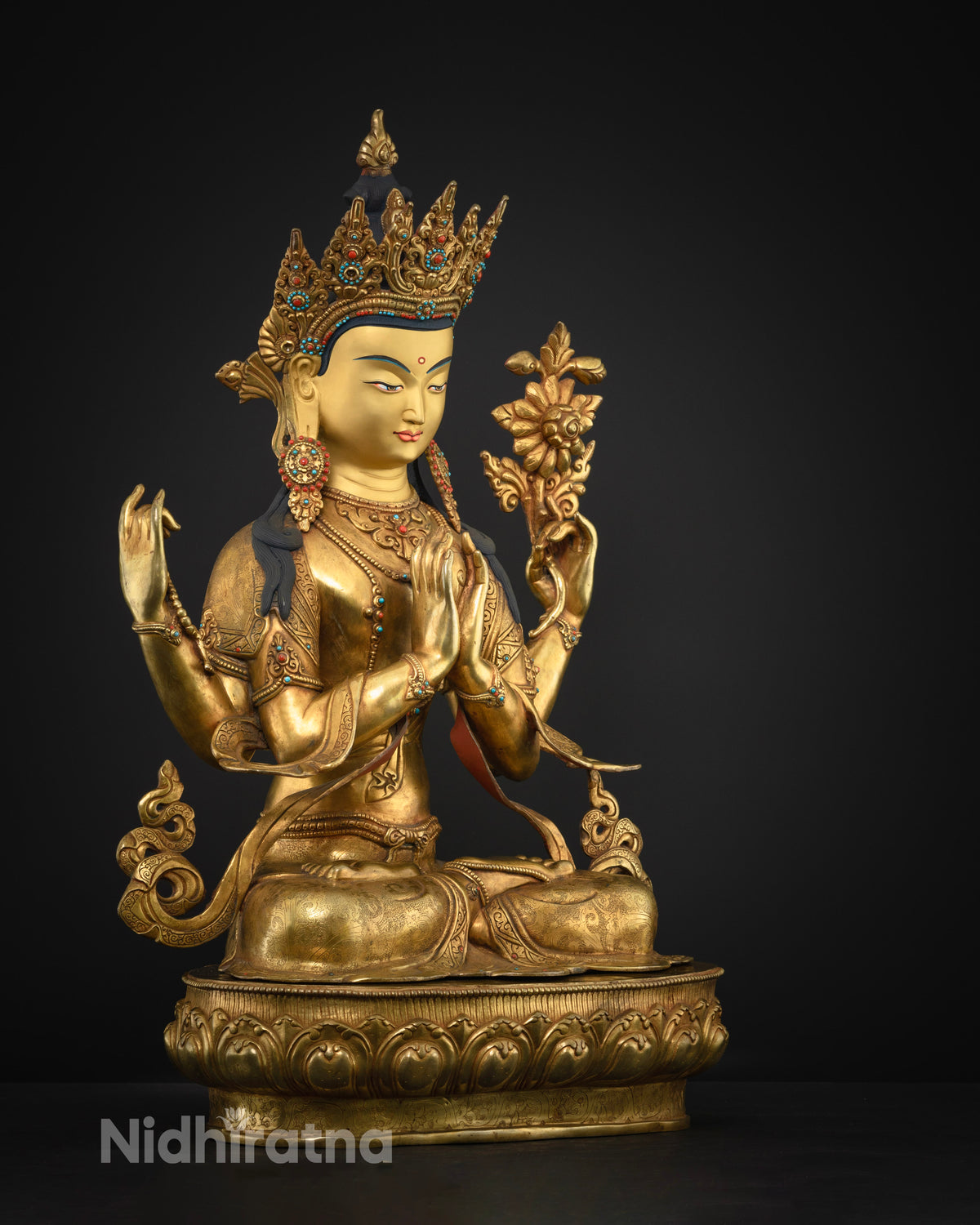 Right side view of Four-Armed Chenrezig statue, gold-gilded copper sculpture