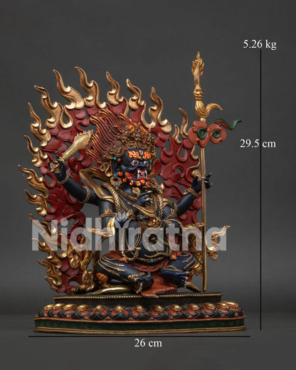 Right side view of Four Armed Mahakala statue in gold gilded copper