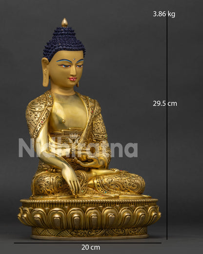 Right side view of gilded copper Shakyamuni Buddha statue in meditation pose