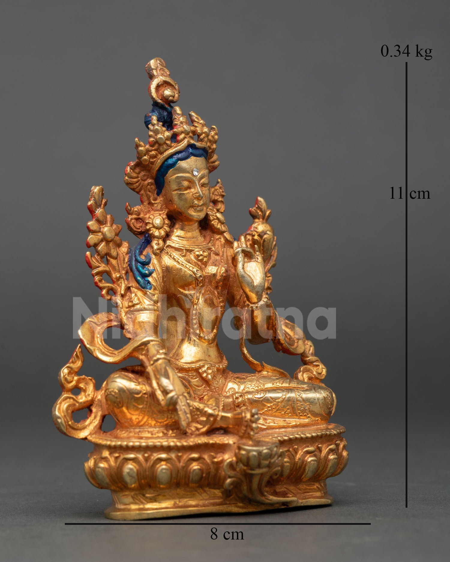 right side view of green tara buddhist statue in gold fire gilded copper