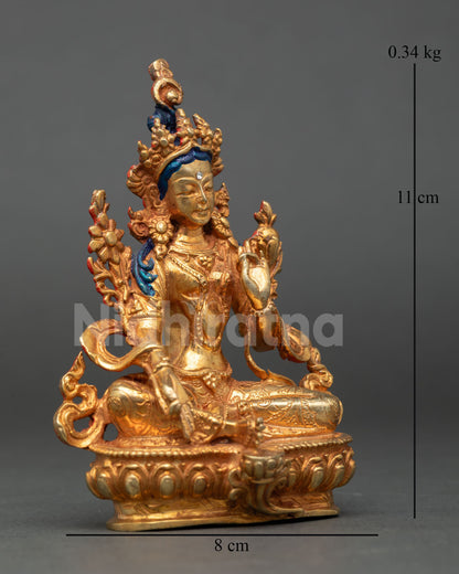 right side view of green tara buddhist statue in gold fire gilded copper