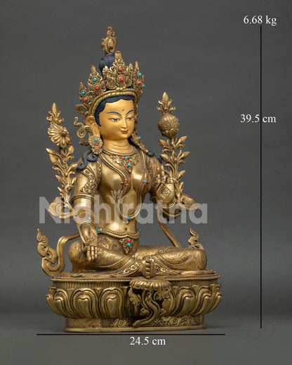right side view of green tara jetsun dolma statue with traditional himalayan artistry