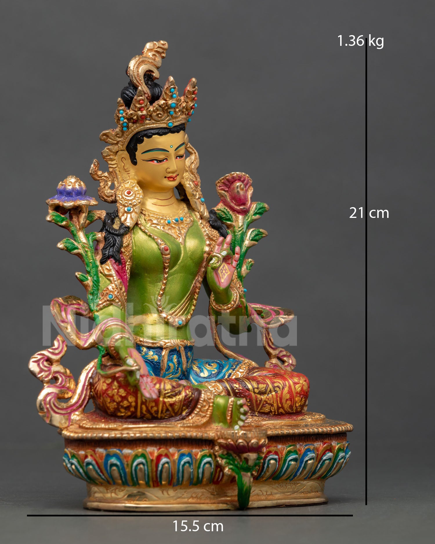 right side view of green tara maa figurine with lotus base and acrylic painted body