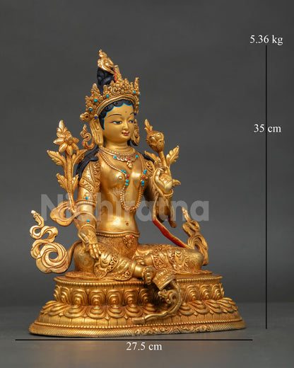 Right-side view of Green Tara statue handcrafted from copper with traditional fire gilding