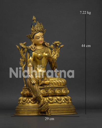 Right side view of Green Tara statue showing Varada Mudra and elegant robes.