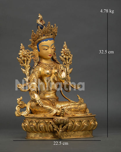 right side view of green tara statue with copper body and fire gold gilding
