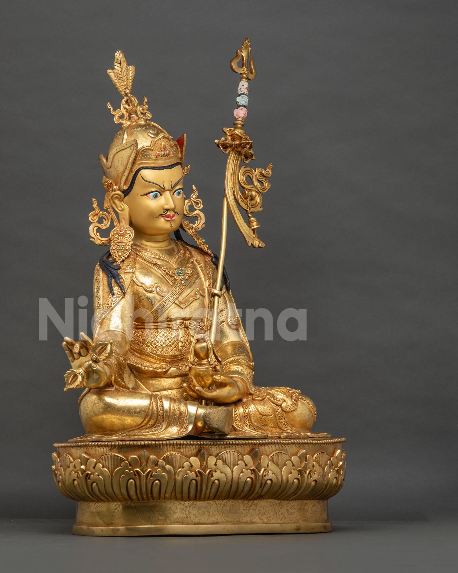 Right Side View of Guru Rinpoche Statue Holding Vajra, Symbol of Indestructible Wisdom