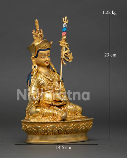 Right side view of Guru Rinpoche statue with lotus throne and Buddhist symbolic details