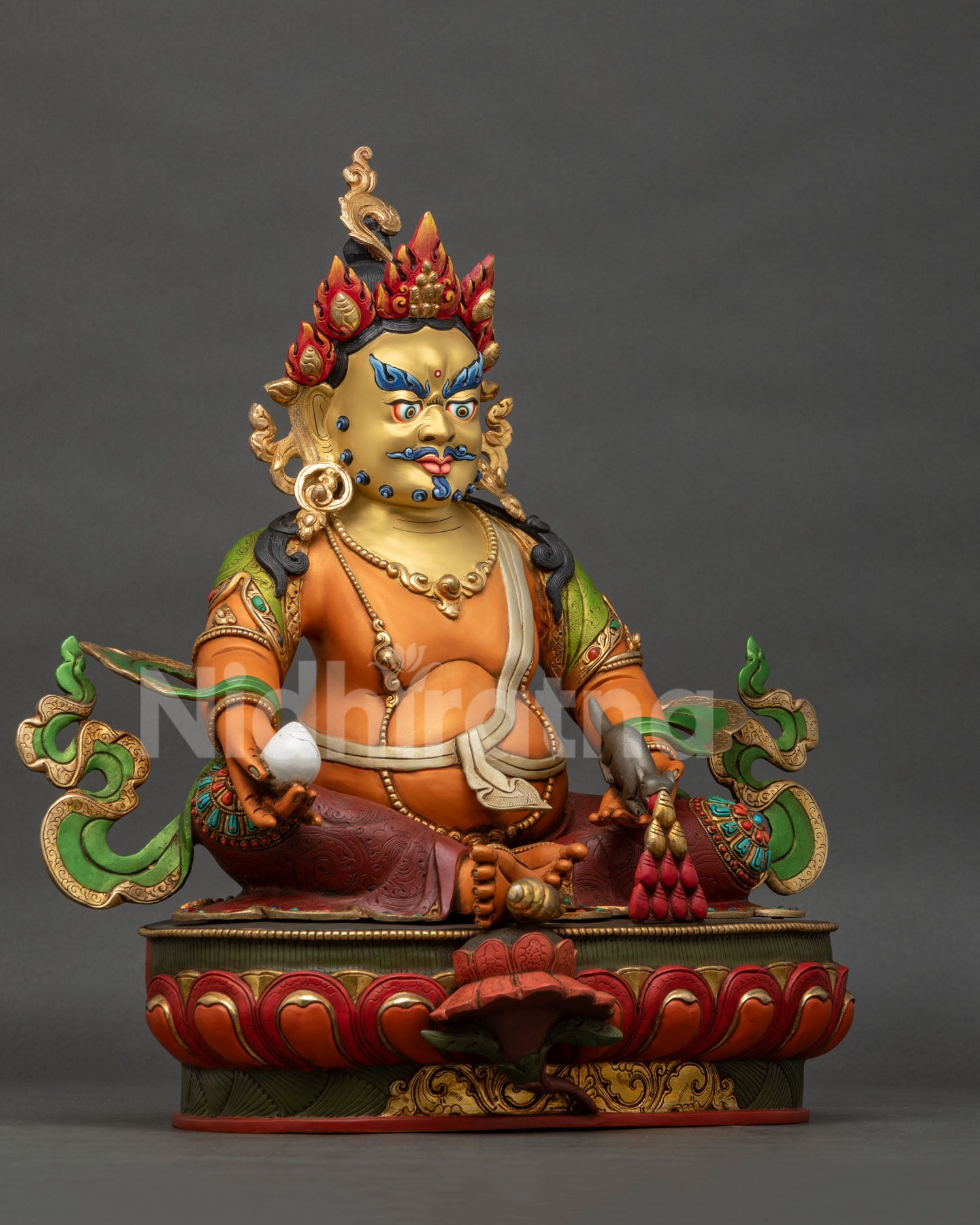 Right side view of handcrafted Dzambhala statue with intricate Buddhist iconography and gold gilded copper