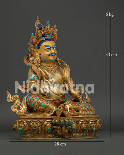 Right side view of handcrafted Jambhala Statue with wealth mongoose citron fruit and lotus throne