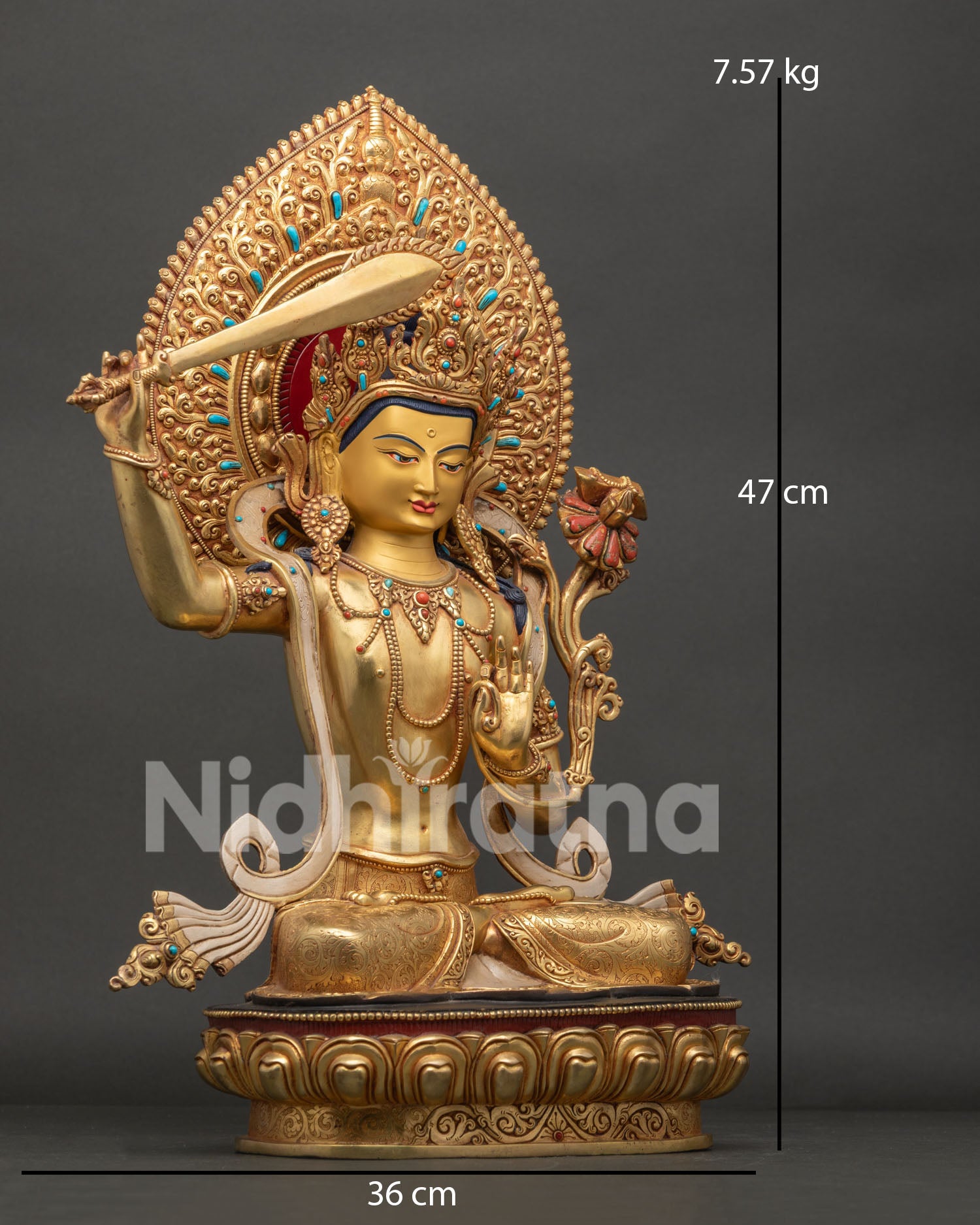 Right side view of handcrafted Manjushri Statue with flaming sword and utpala lotus