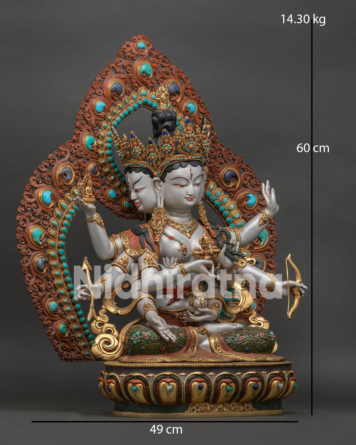 right side view of handcrafted namgyalma statue with lotus throne and ritual implements
