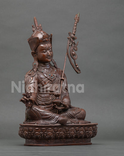 Right side view of handcrafted oxidized copper Guru Rinpoche statue, Padmasambhava from Nepal