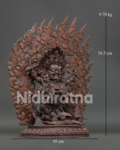 Right side view of handcrafted Six Arm Mahakala Statue in oxidized copper finish