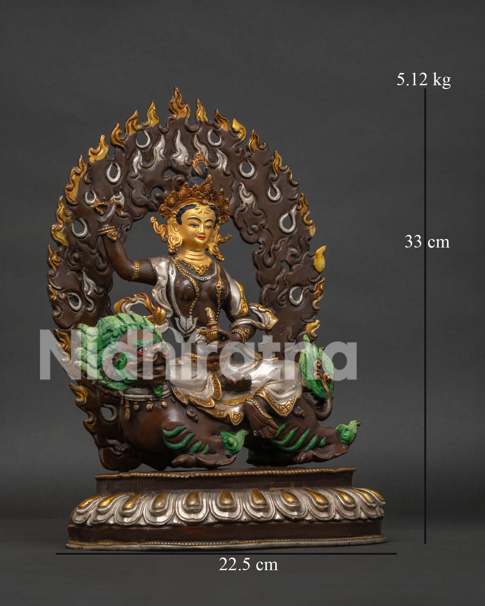 Right side view of handcrafted Tsheringma statue on snow lion throne.