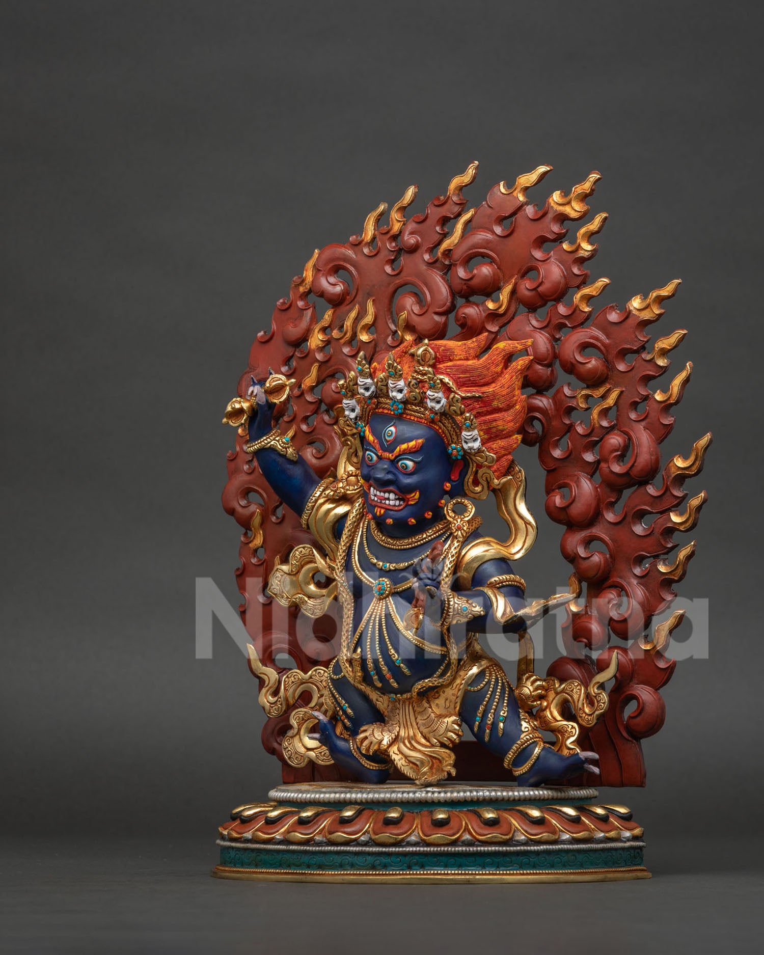 Left side view of handcrafted Nepal Vajrapani statue with lasso and ornate robes
