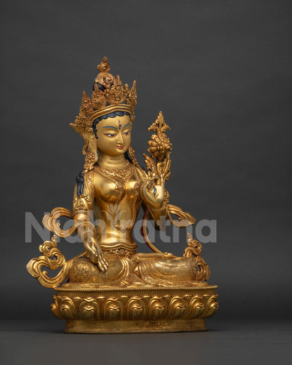Right side view of handcrafted White Tara statue seated on lotus throne