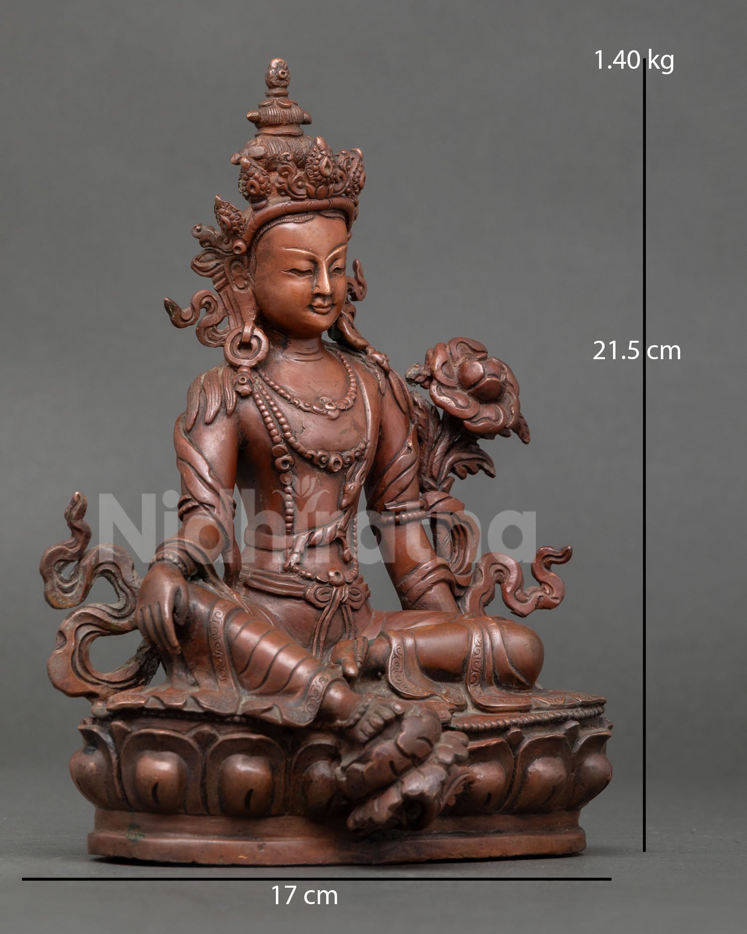 right side view of lokeshvara statue showing royal ease posture and traditional buddhist details