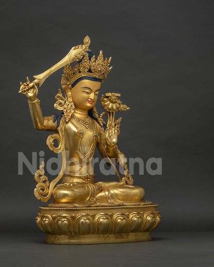 Right side view of Manjushri Statue, 24K gold fire-gilded copper sculpture from Nepal