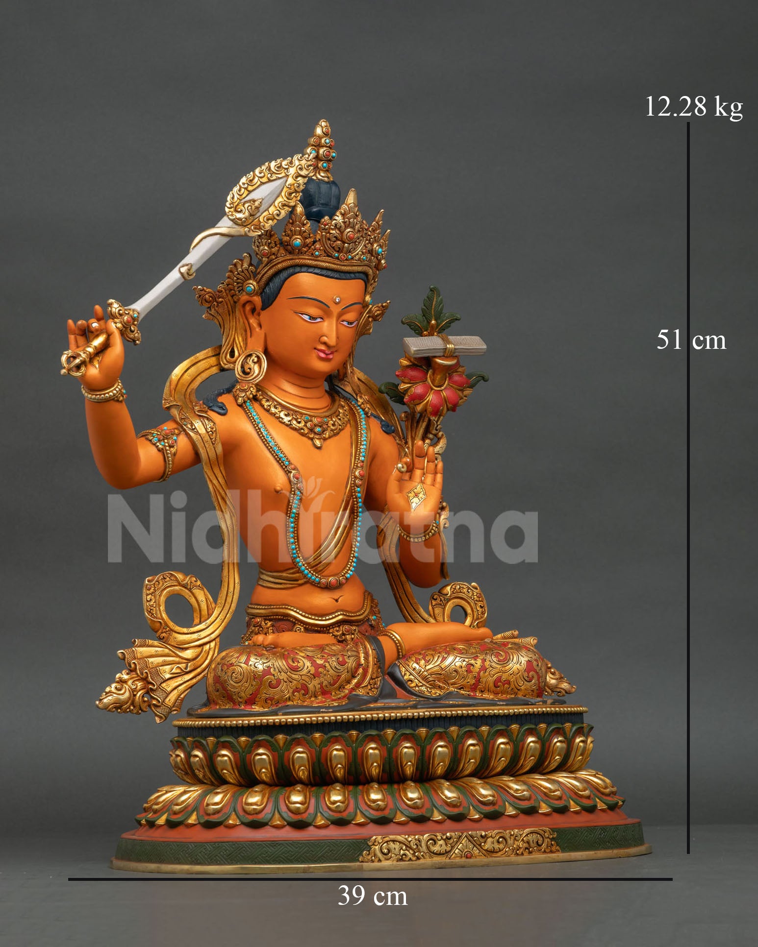 Right side view of Manjushri Statue showcasing copper repoussé garment and acrylic-painted finish