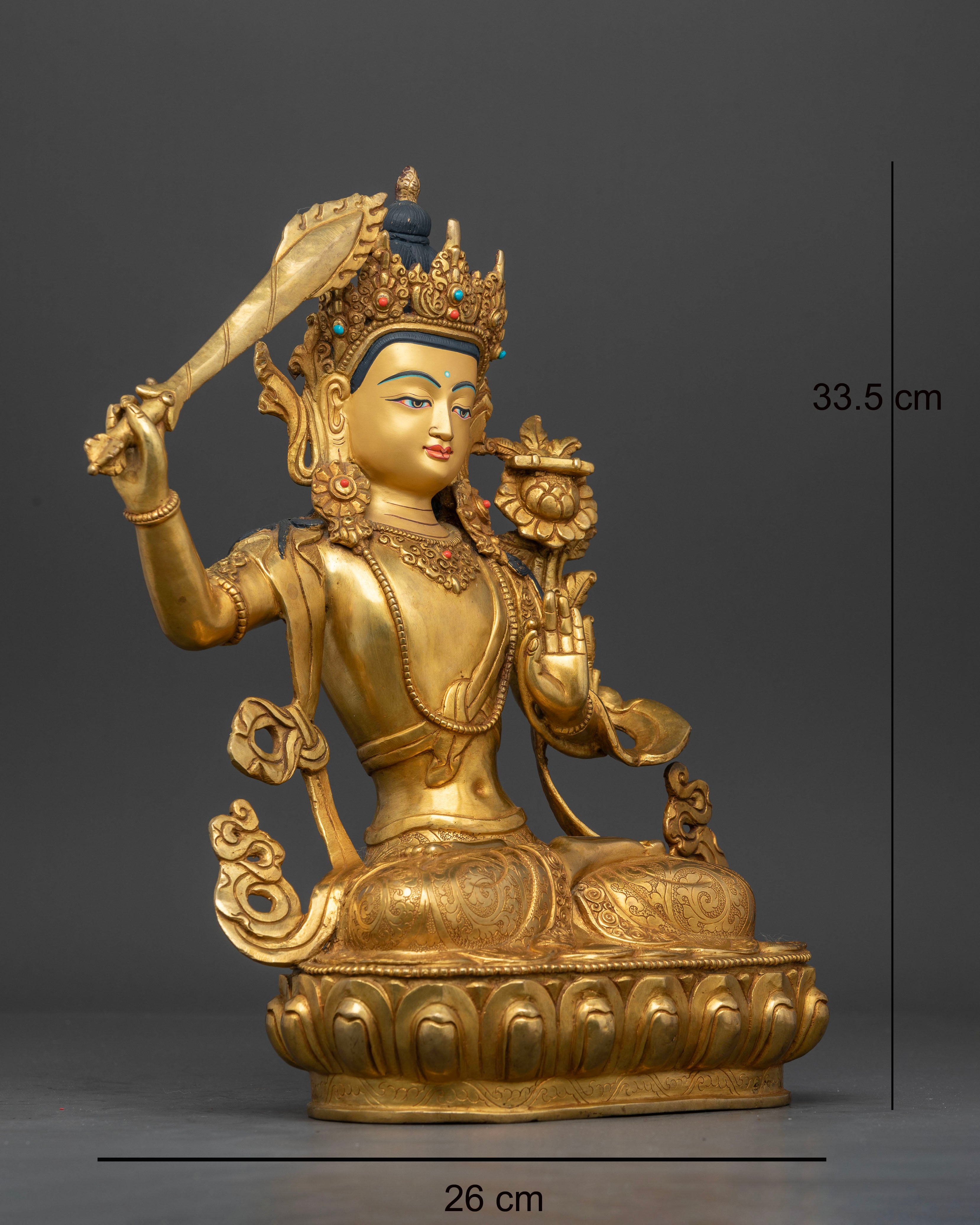 Right side view of Manjushri Statue showing sword and lotus iconography details