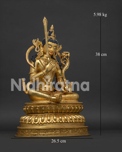 Right side view of Manjushri Statue with flaming sword and lotus stem in gold finish