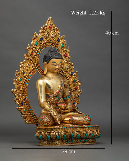 Right side view of Medicine Buddha statue holding myrobalan herb in Varada mudra